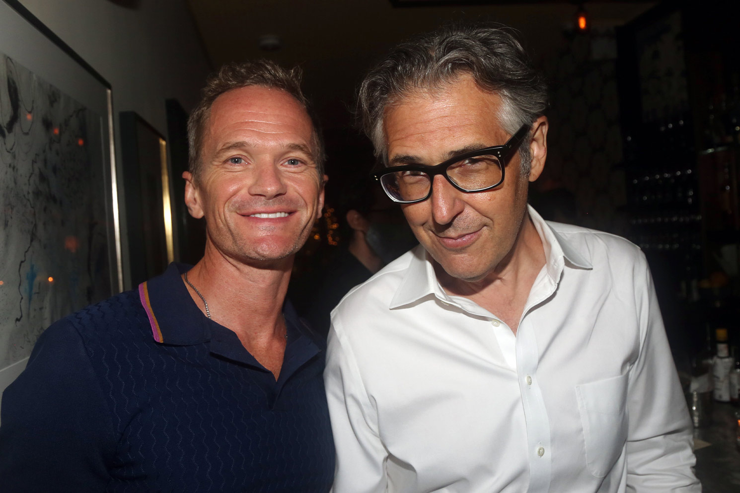 Neil Patrick Harris and Ira glass pose for photo at event together
