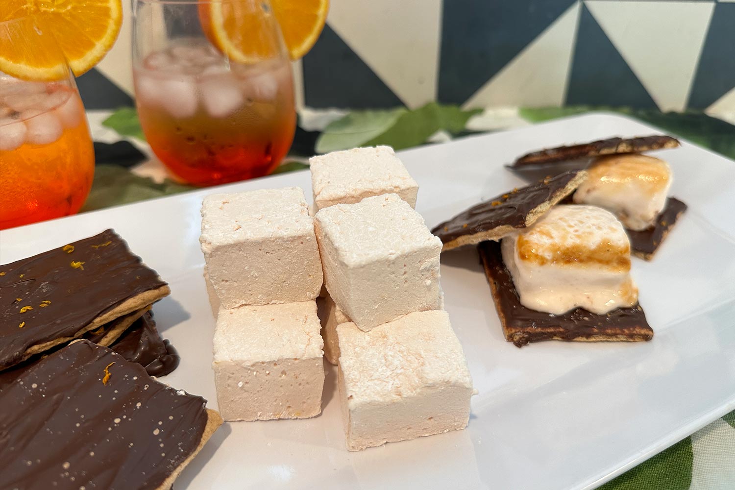 Square marshmallows on chocolate covered graham crackers