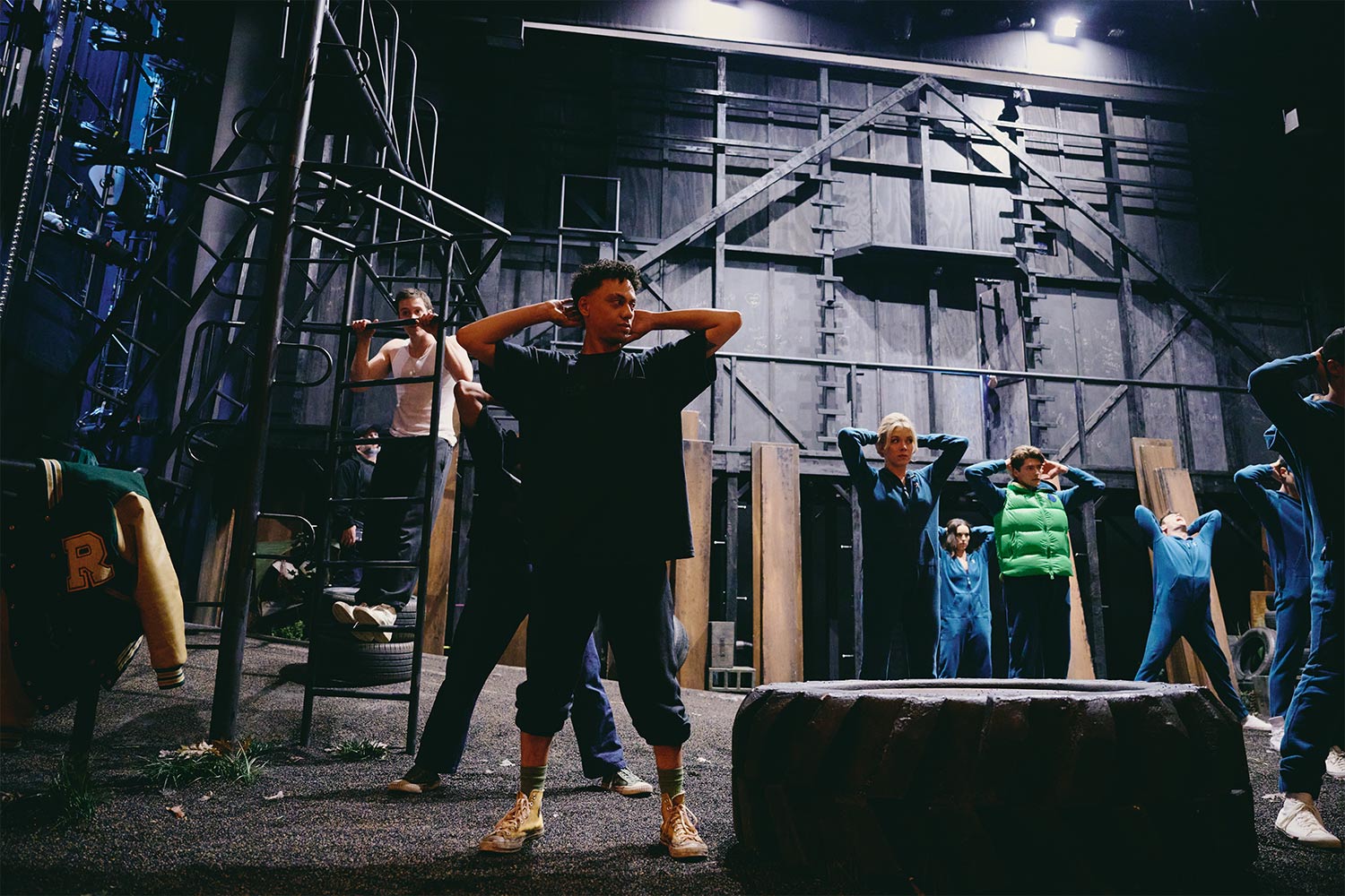 The cast of the Broadway musical "The Outsiders" rehearsing in the Bernard B. Jacobs Theatre